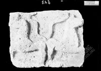 Bas-relief with schematic flat image of two horses with heads in contrary directions and highly raised tails