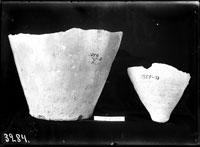 Amphora bottoms: 1) Lower body of amphora with flat base, from the Midiaeval Period, discovered in room no. 12
