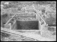Building a lean-to above fish-salting cistern B, excavted in 1937